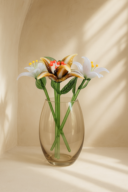 Glass vase with artificial flowers on a beige background
